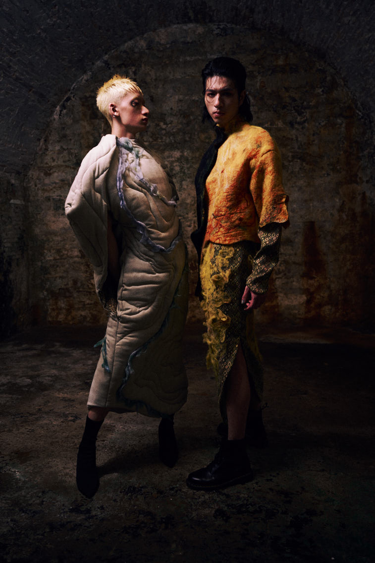 two men in wool felting cloth