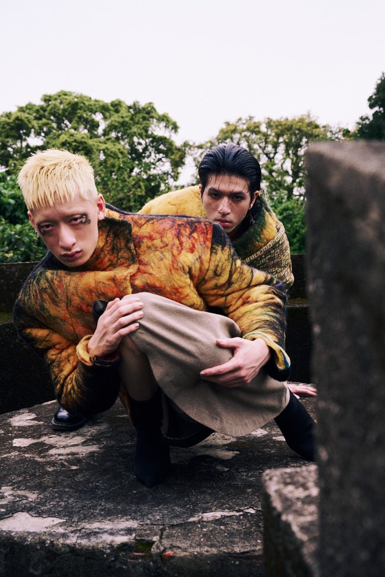 two men in wool felting cloth, warn color