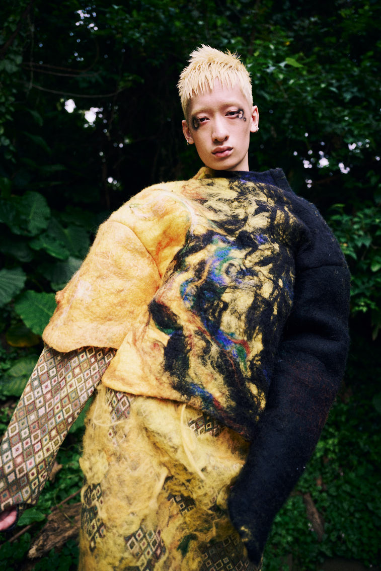 a man in wool felting cloth, warn color