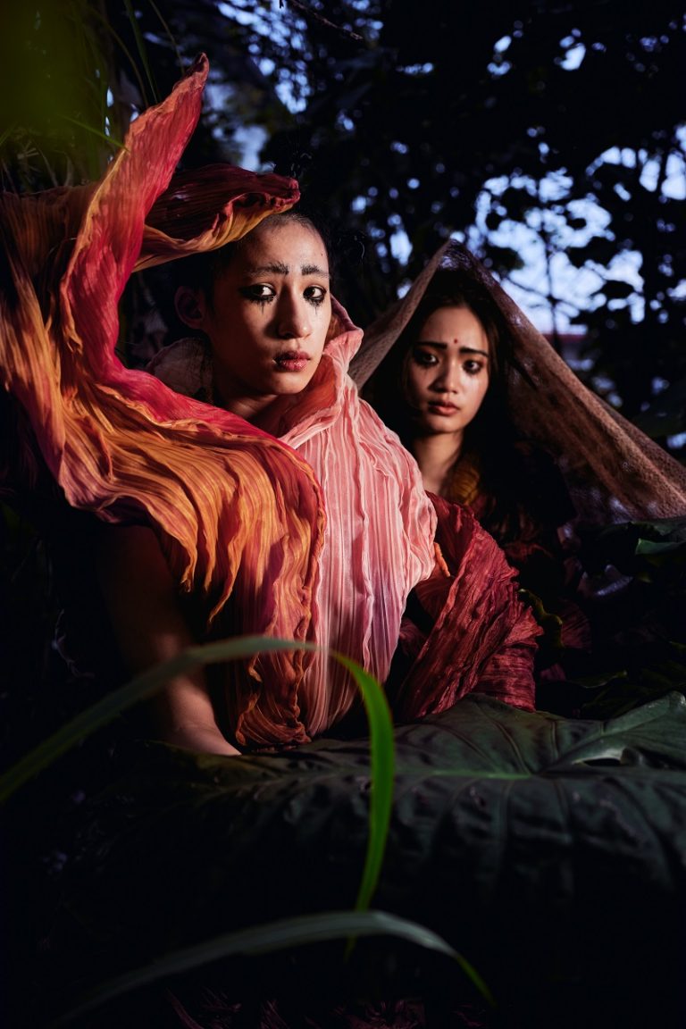 fiber art, wearable installation, two persons in a forest